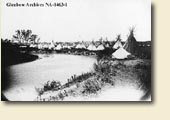 Blackfoot camps were composed of members of an extended family and
          other people who may have joined the clan. The arrangement of the tipis was not strictly defined in these camps, although all of them faced
          east. This allowed the morning prayers to travel towards the rising sun, helping it to come above the horizon for another day.Glenbow
          Archives NA-1463-1