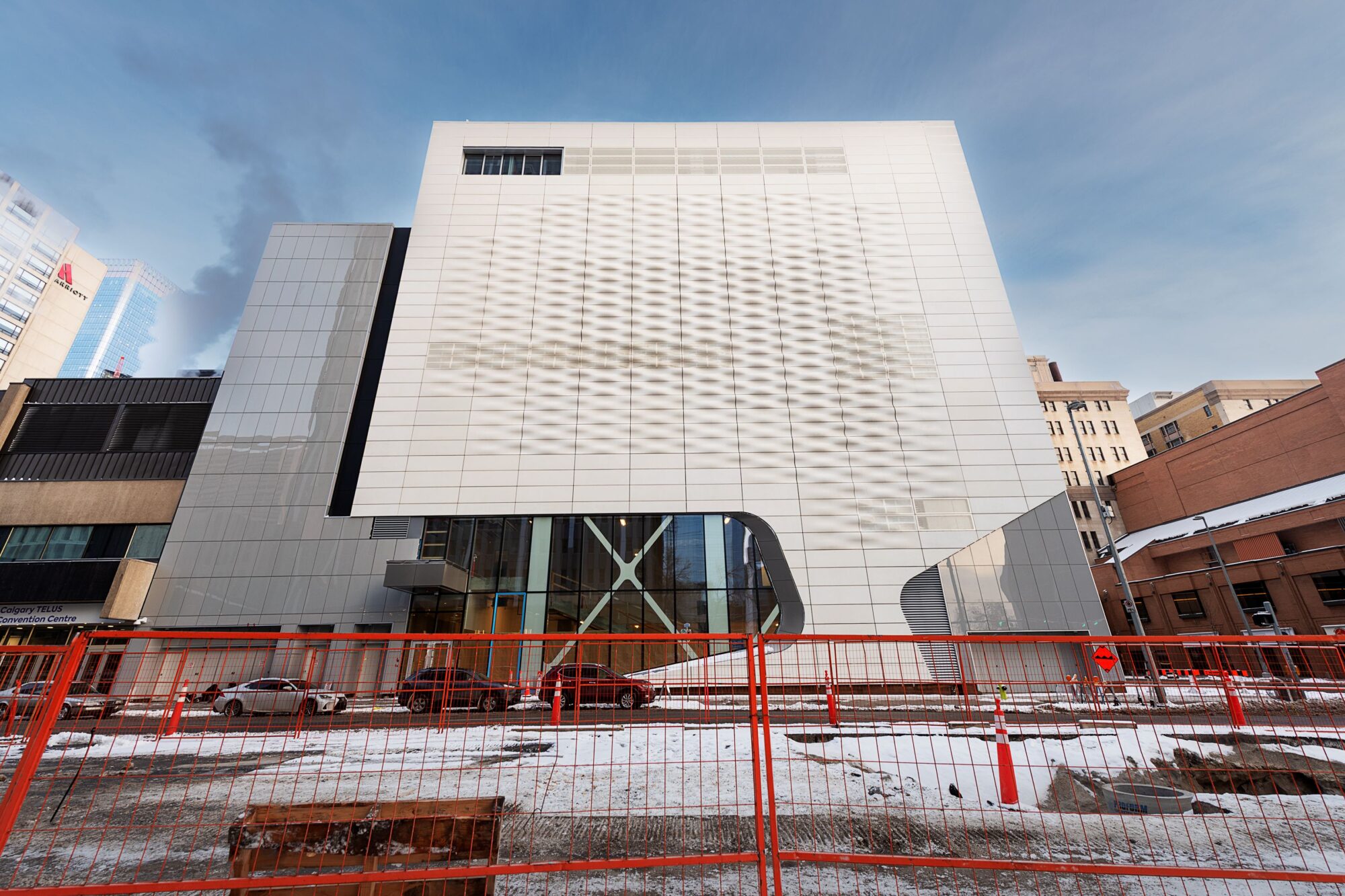 A large, white, textured building.