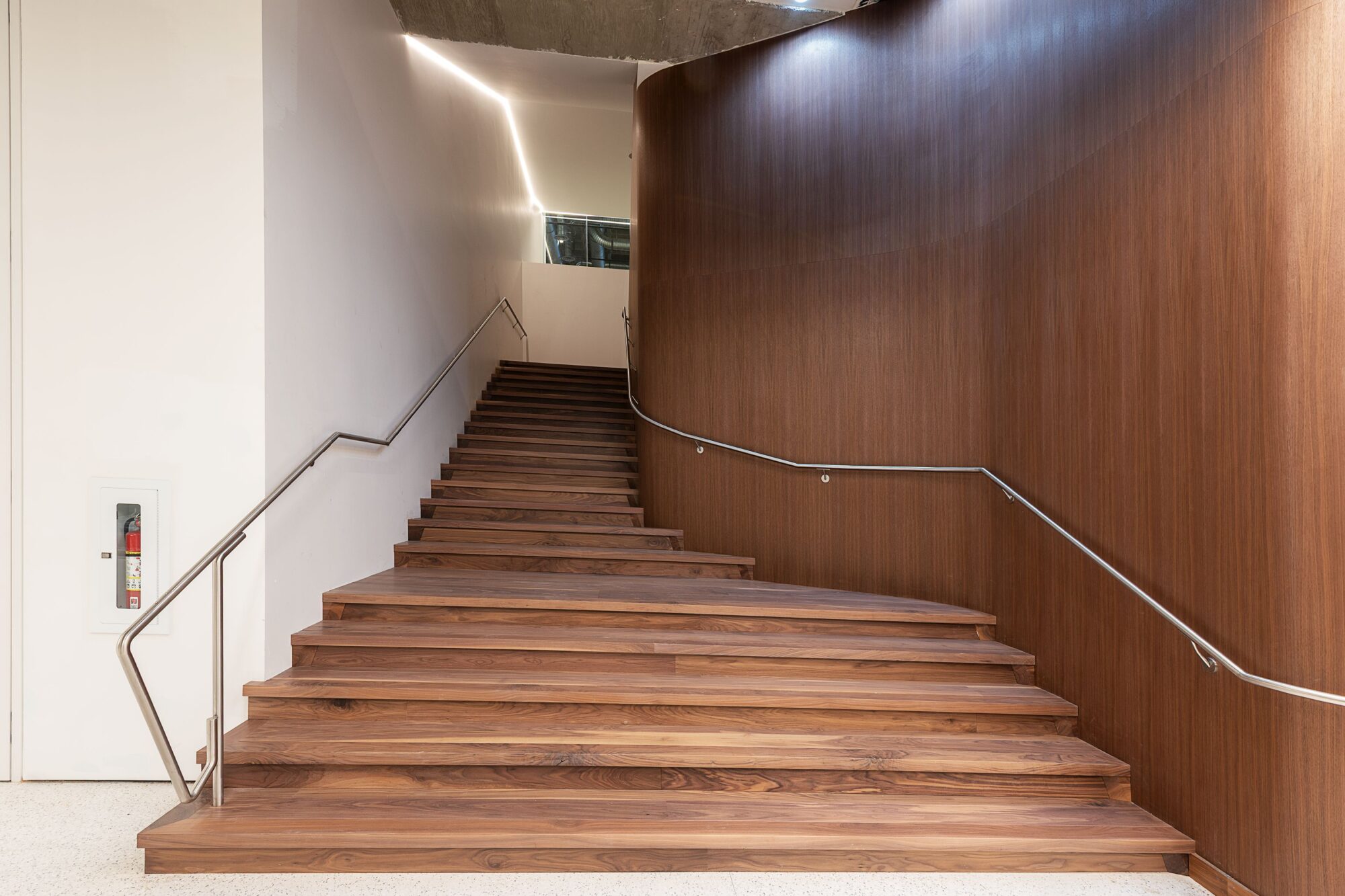 A dark wooden staircase.