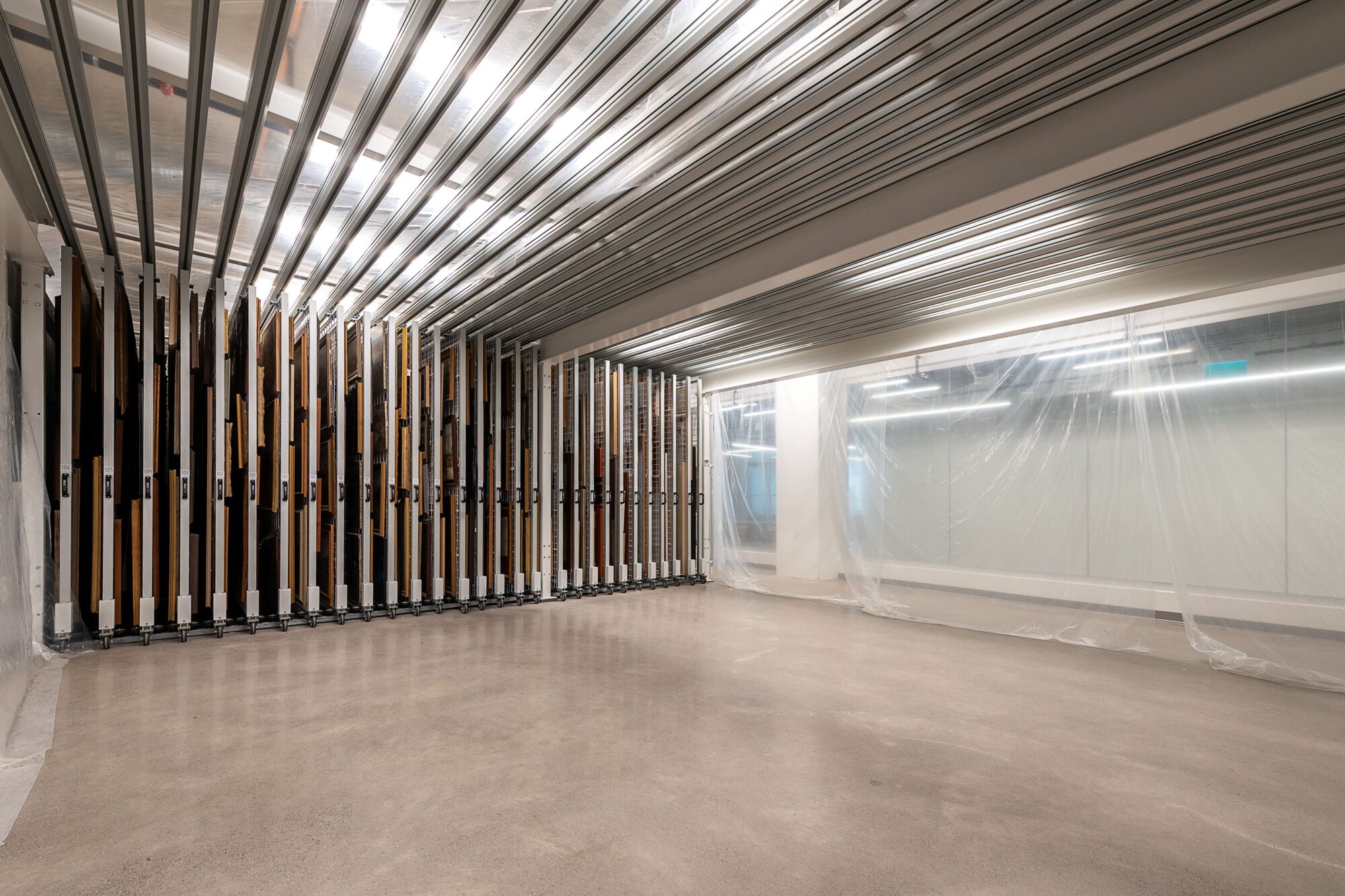 A row of painting storage racks.